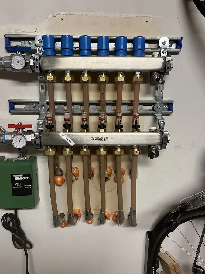 Plumber performing Gas Line Installation at a residential property in Lowell